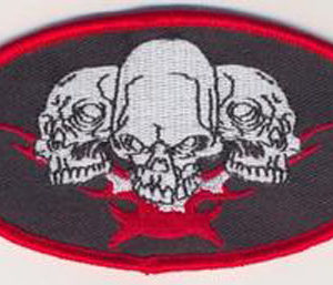 Triple Skulls With Tribal Flame